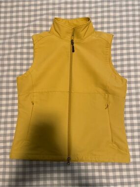 Ibex Women’s Climawool Cirrus Softshell Vest in Golden Yellow. Size M